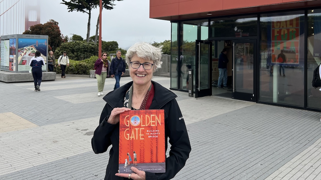 Photo of author Elizabeth Partridge in front of the Golden Gate Bridge Welcome Center.
