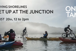 Bikers and kayakers merge along Bothin Marsh's multi-use path at high tide
