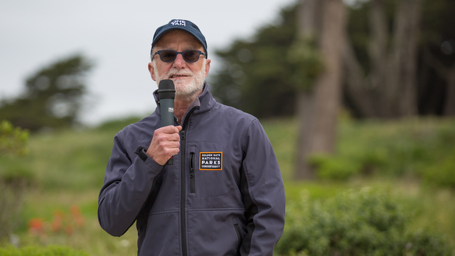 Greg Moore speaking at an event