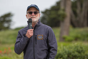 Greg Moore speaking at an event