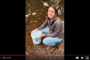 A teacher connected with her students via video for their trout release.