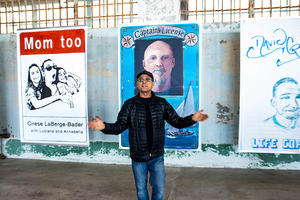 Artist Gregory Sale with some of the artwork at 'Future IDs at Alcatraz,' on display at the island through October.