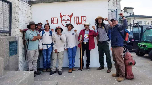 Eloy Martinez, third from right, at an event on Alcatraz.