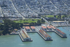 Aerial photo of Fort Mason, the San Francisco Bay, and the city.