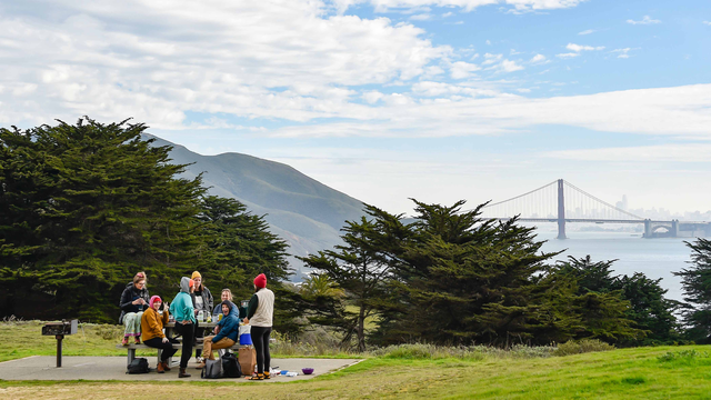 People picnic at Battery Wallace in Marin with Golden Gate Bridge views