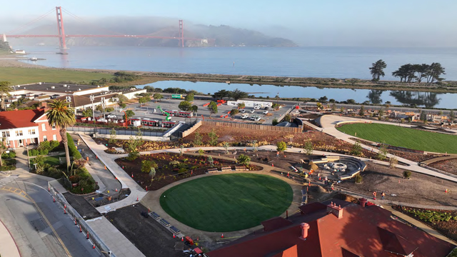 New Presidio Tunnel Tops under construction, with Golden Gate Bridge in the distance
