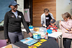 Yolanda Molette connects with participants at a workshop featuring butterfly migration.