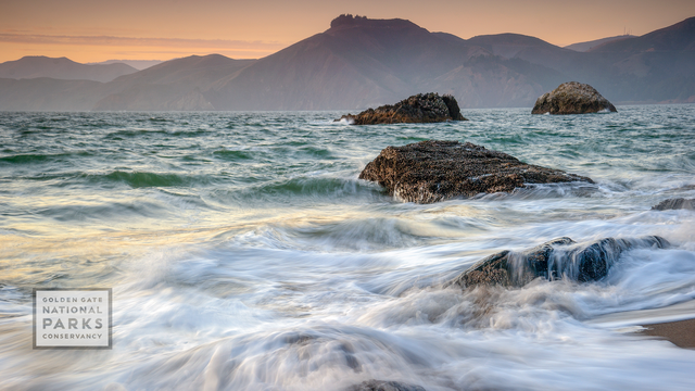 waves at the Presidio Beach at sunset