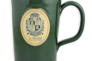 Dark green mug with the Presidio US Army coat of arms