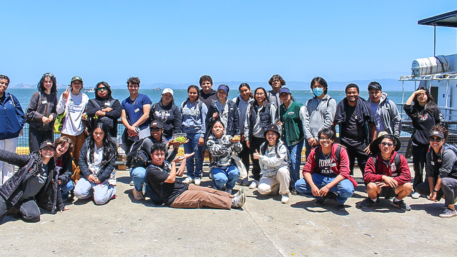 A group of Crissy Field Center youth leadership program members at the docks of Alcatraz Island.