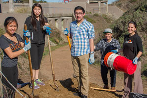 Teens Working on Batteries to Bluffs Trail