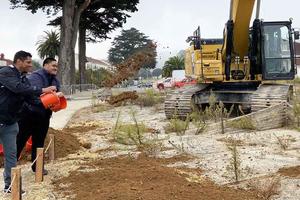 Tossing dirt during the Tunnel Tops "Groundmaking" event.