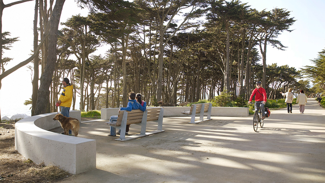 People on a trail and at an overlook