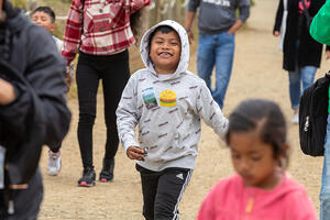 Participants from ALAS (Ayundando Latinos A Soñar) enjoying the "Raíces en la Bahía/Rooted in the Bay" event for farmworkers and their families in September 2024. Activities included crabbing, hiking, and beachside recreation.