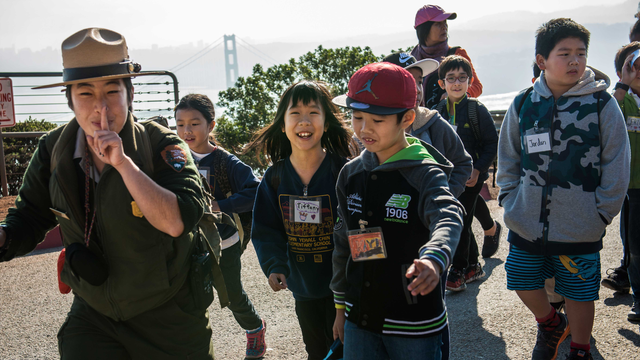 Ranger Kelsi Ju leads a class of students in the Marin Headlands