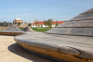 A view of The Palace of Fine Arts and San Francisco skyline from the park bench at the Presidio Tunnel Tops.