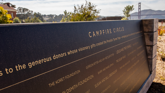 A commemorative plaque at the Tunnel Tops Campfire Circle honors the donors who made the park possible.