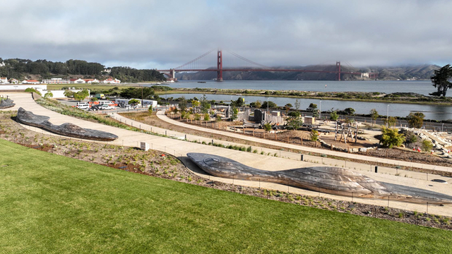 An aerial overlook of the Presidio Tunnel Tops, looking out to the Golden Gate Bridge.