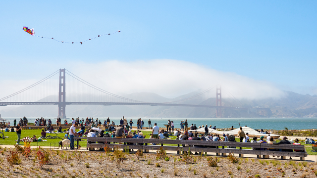 The Golden Gate Bridge spans the scenic view from the Tunnel Tops on a beautiful opening day.