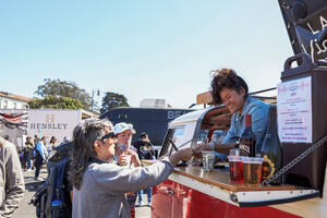 A vendor sells drinks at Presidio Tunnel Tops Opening Day.