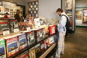 Customer looking at a Capone book in an Alcatraz Island store