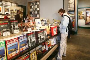 Customer looking at a Capone book in an Alcatraz Island store