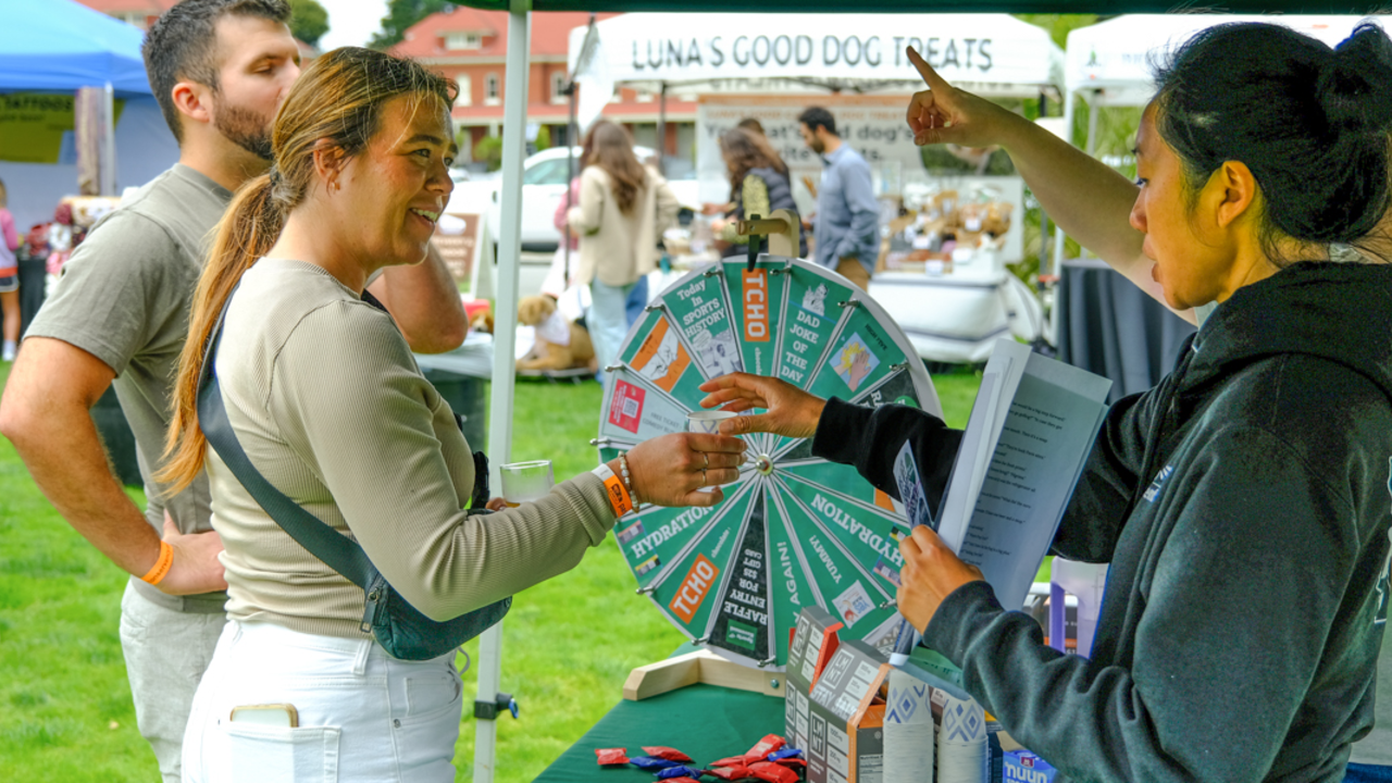 Parks4All: Brewfest visitor wins some freebies from local event sponsors. 