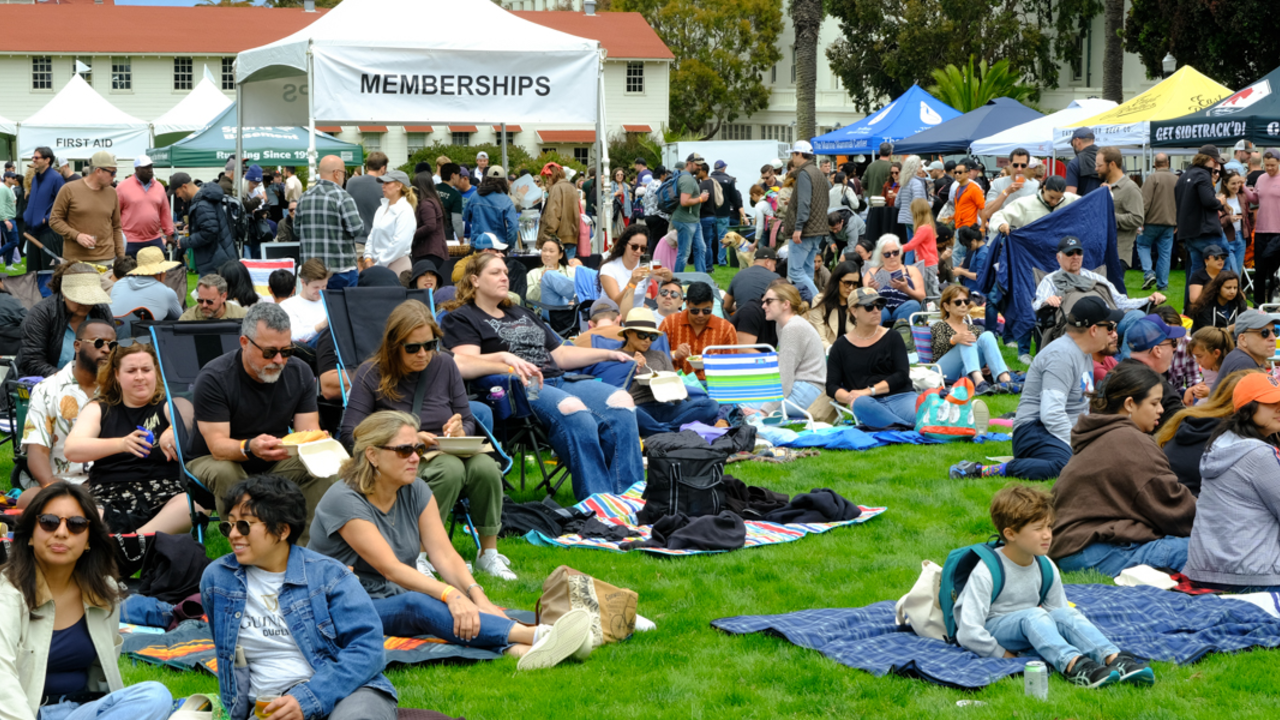 A crowd gathered on the Presidio Lawn for Parks4All: Brewfest in San Francisco.