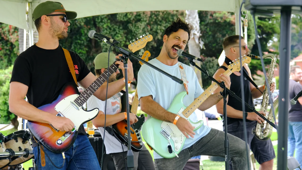 A live band performs for the crowds at Parks4All:Brewfest in the Presidio of San Francisco.