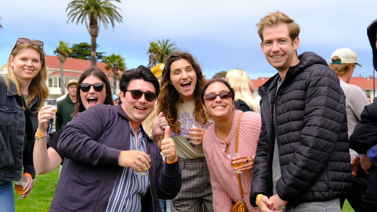 A group of friends gathered for a photo at the Presidio of San Francisco Parks4All: Brewfest