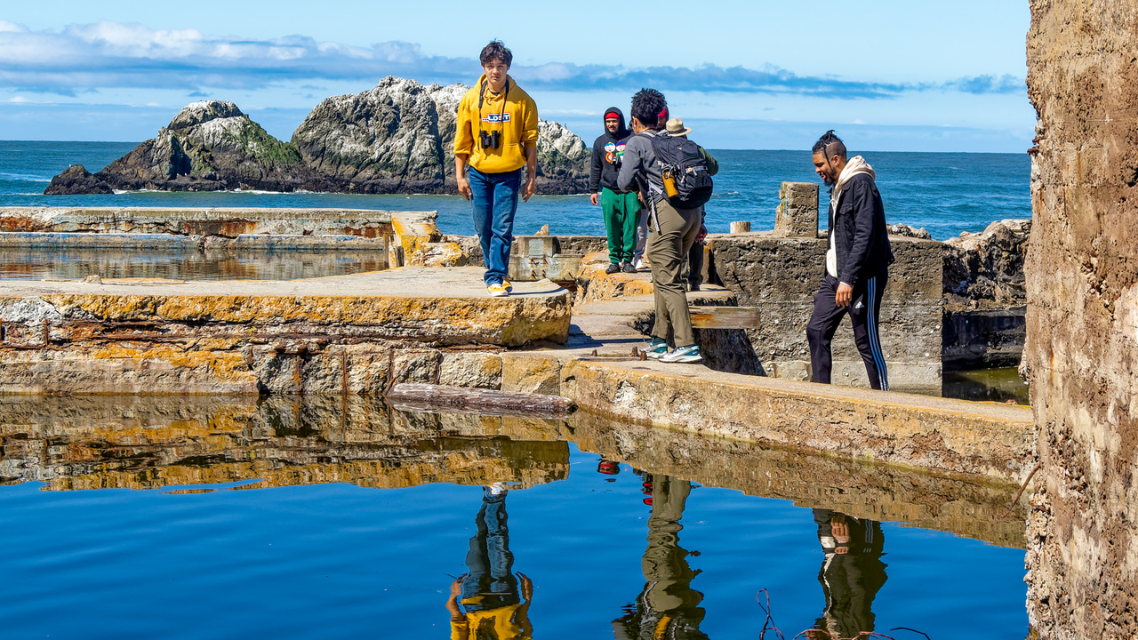 People walking on ruins of Sutro Baths