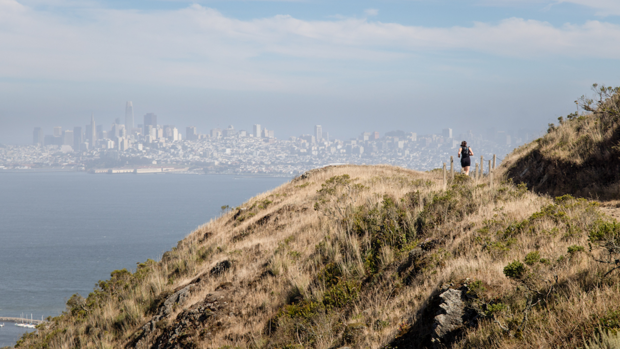 Trail runner on the SCA Trail in the Marin Headlands.