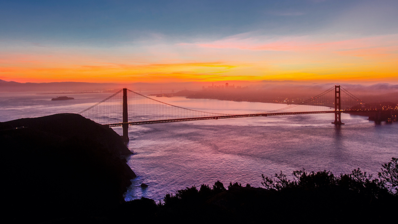 Sunrise from the Marin Headlands showing the Golden Gate Bridge.
