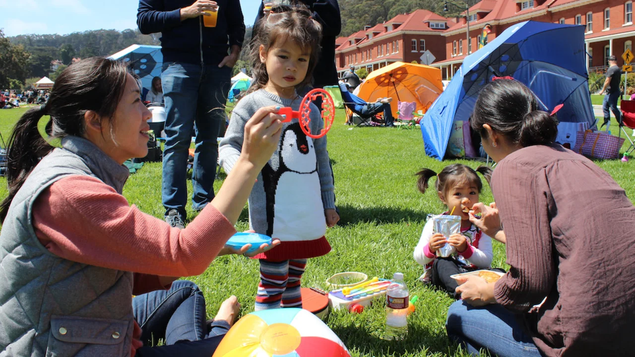 Kiddos blowing bubbles in the Presidio.