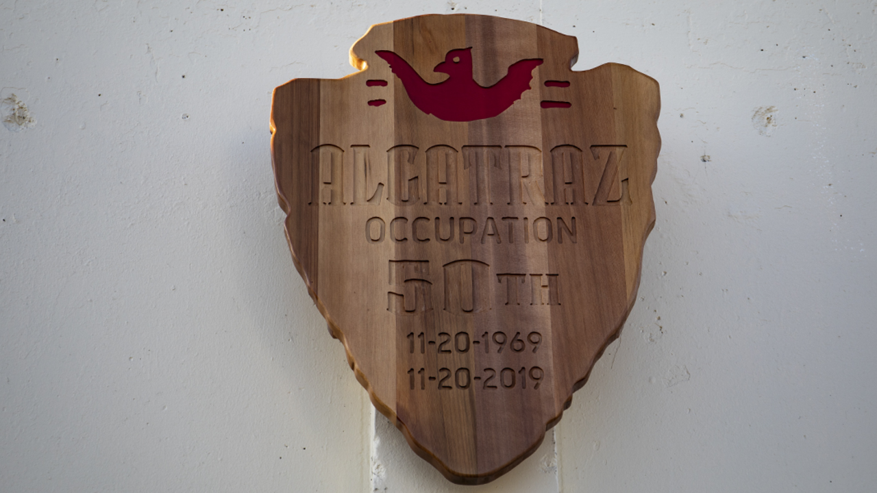 NPS arrowhead commemorating Alcatraz Occupation