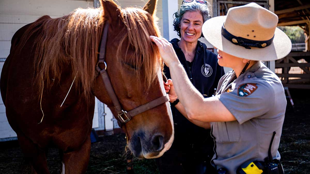 Lainie Motamedi and Park Ranger Katlyn Grubb at the Horse Mounted Patrol Stables in the Marin Headlands. Lainie Motamedi and Park Ranger Katlyn Grubb at the Horse Mounted Patrol Stables in the Marin Headlands.