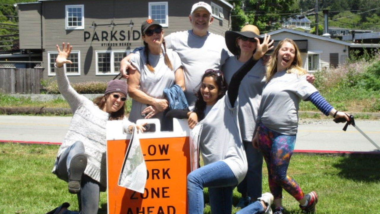 Volunteers celebrating in Stinson Beach.