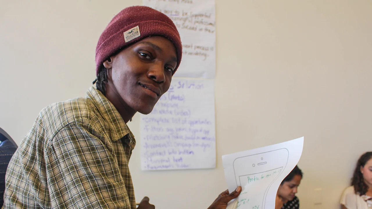 A student brainstorming a new website design