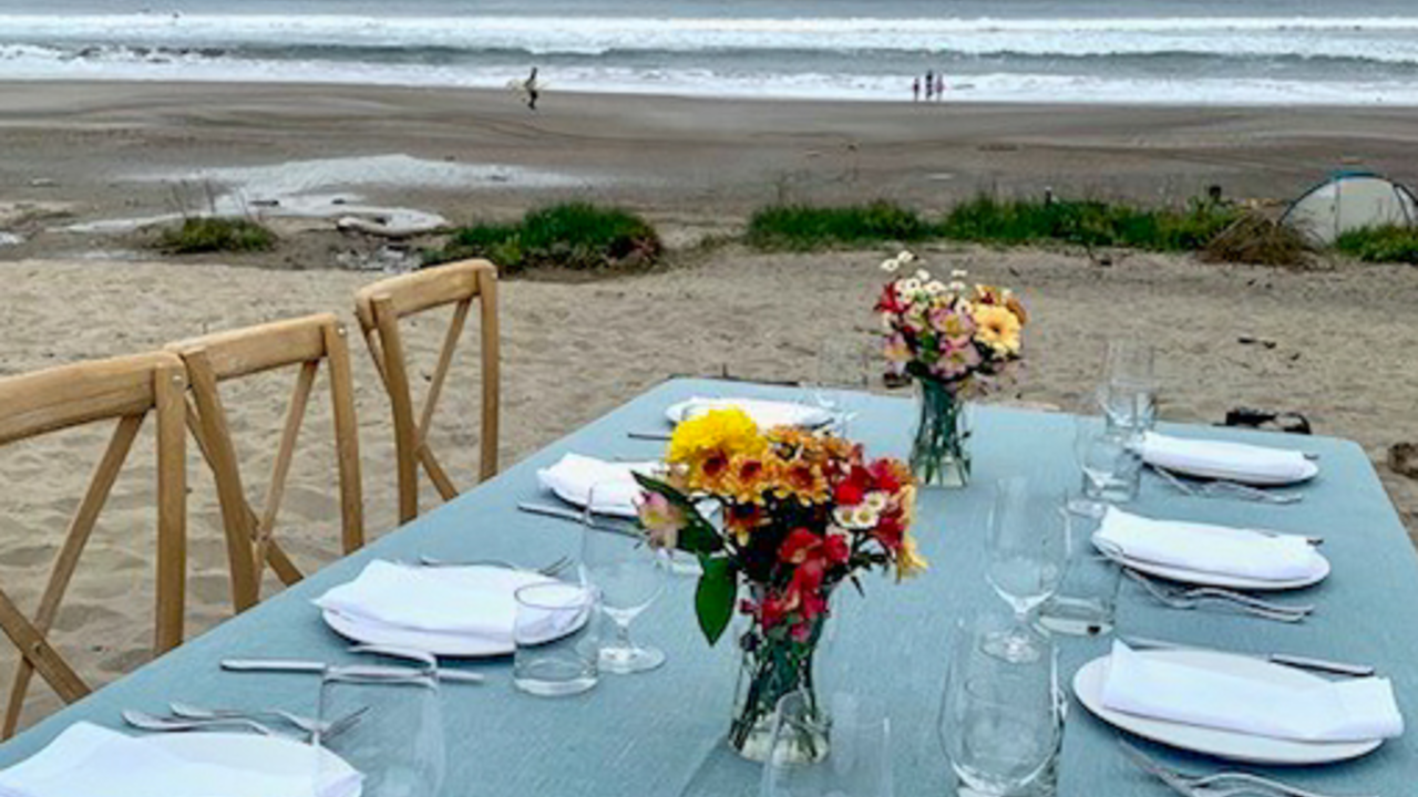 A fancy dining table is set on Stinson Beach.