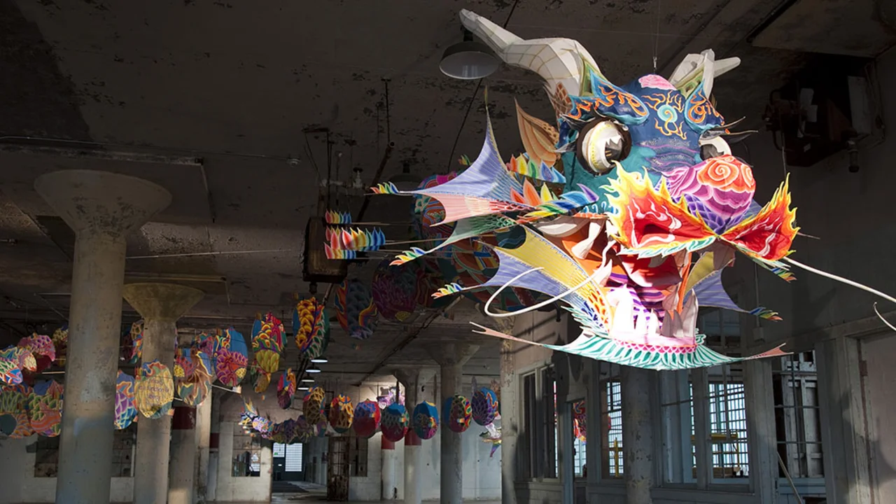 Colorful dragon suspended in an old Alcatraz prison building