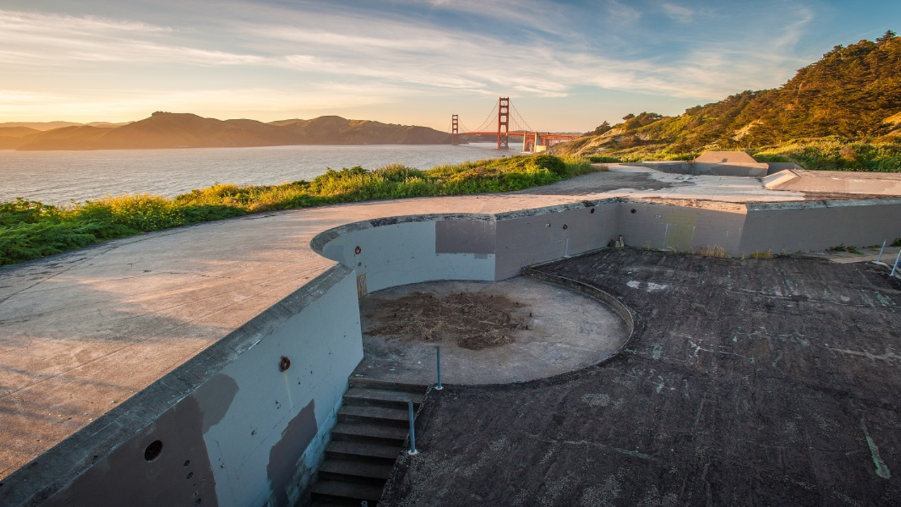 Image of a coastal battery with the Golden Gate Bridge in the distance