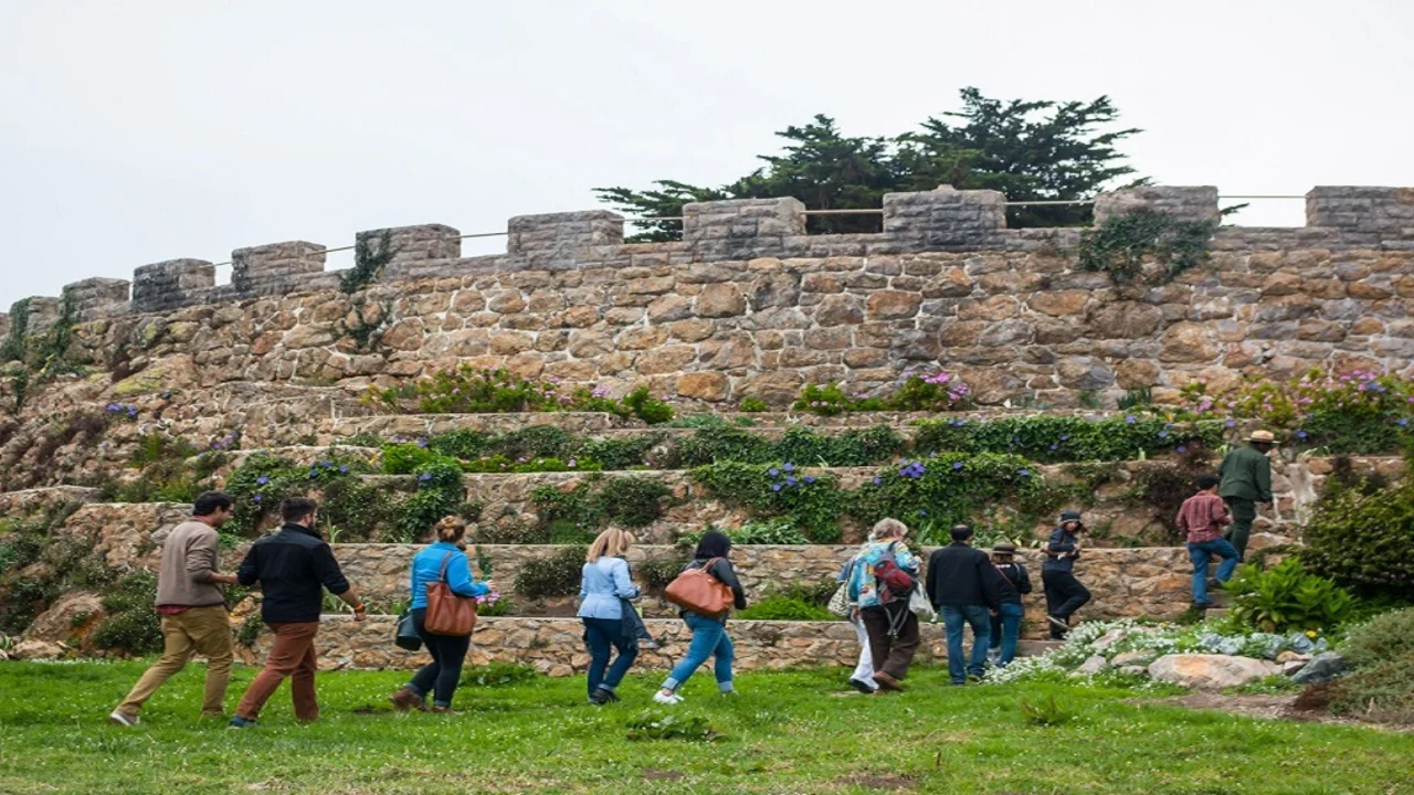 Group of hikers being guided by a Park Ranger