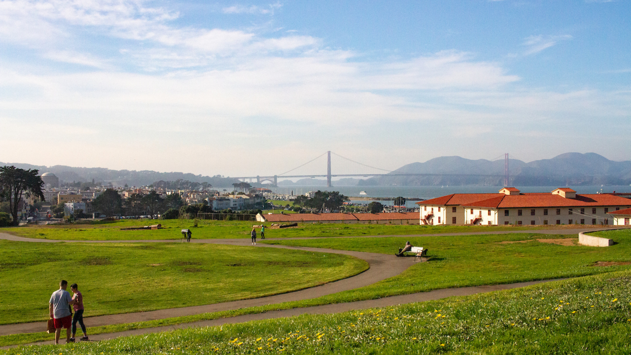 Visitors enjoying the Fort Mason lawn
