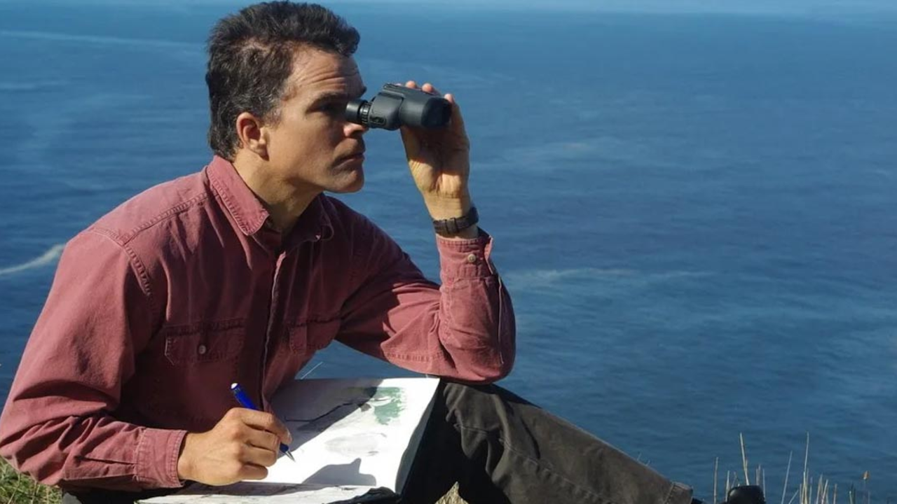 John Muir Laws looking through binoculars Intro to Nature Journaling