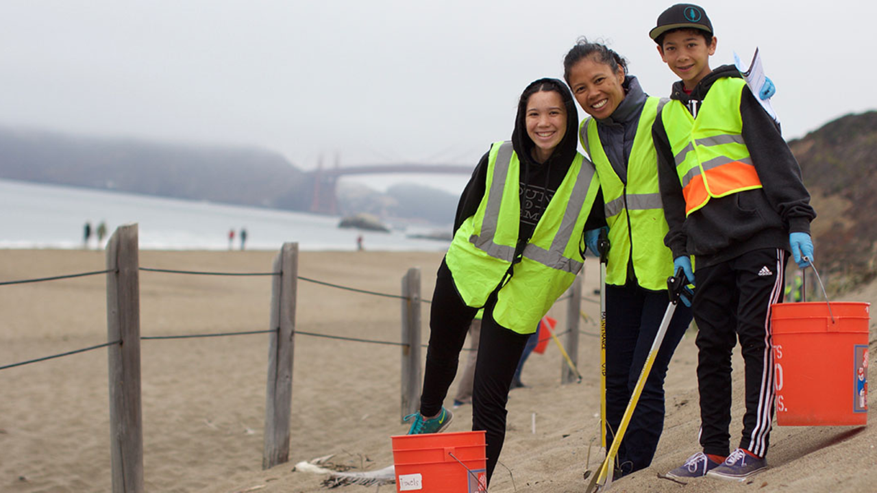 Volunteers steward beaches of Golden Gate Volunteers participating in a beach cleanup