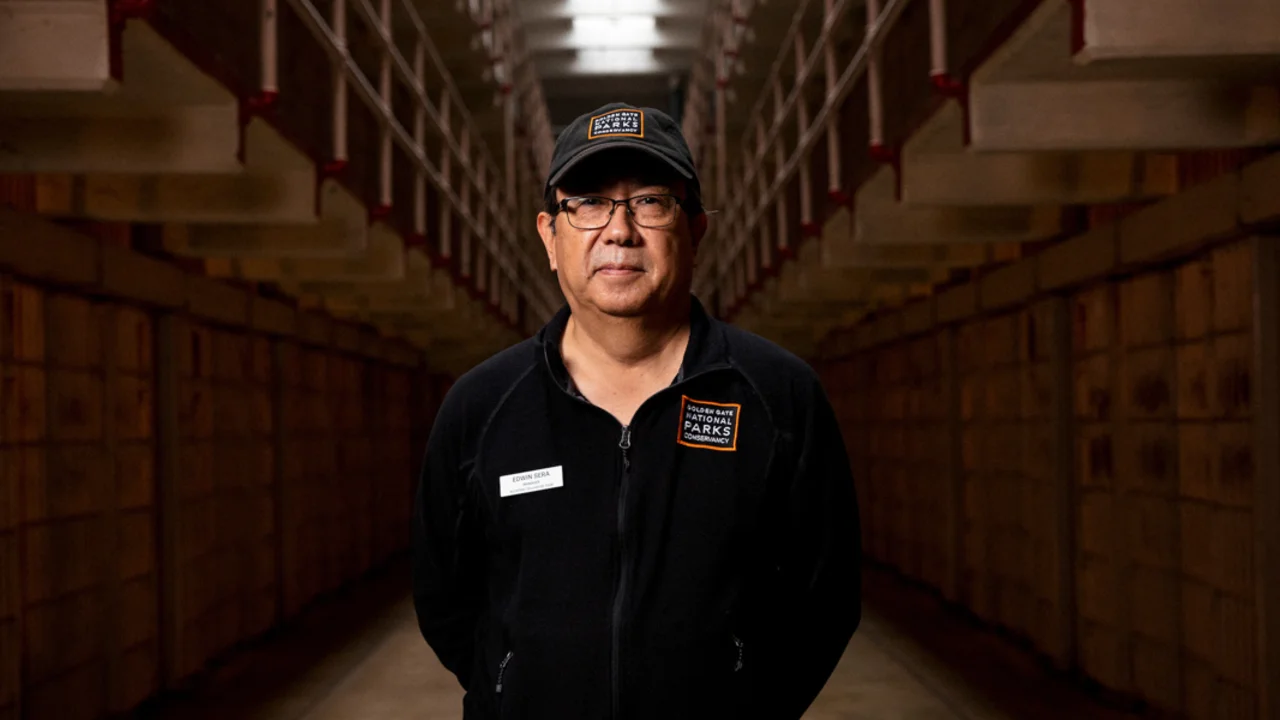 Alcatraz staff member Edwin Sera stands in the Alcatraz Cellhouse.