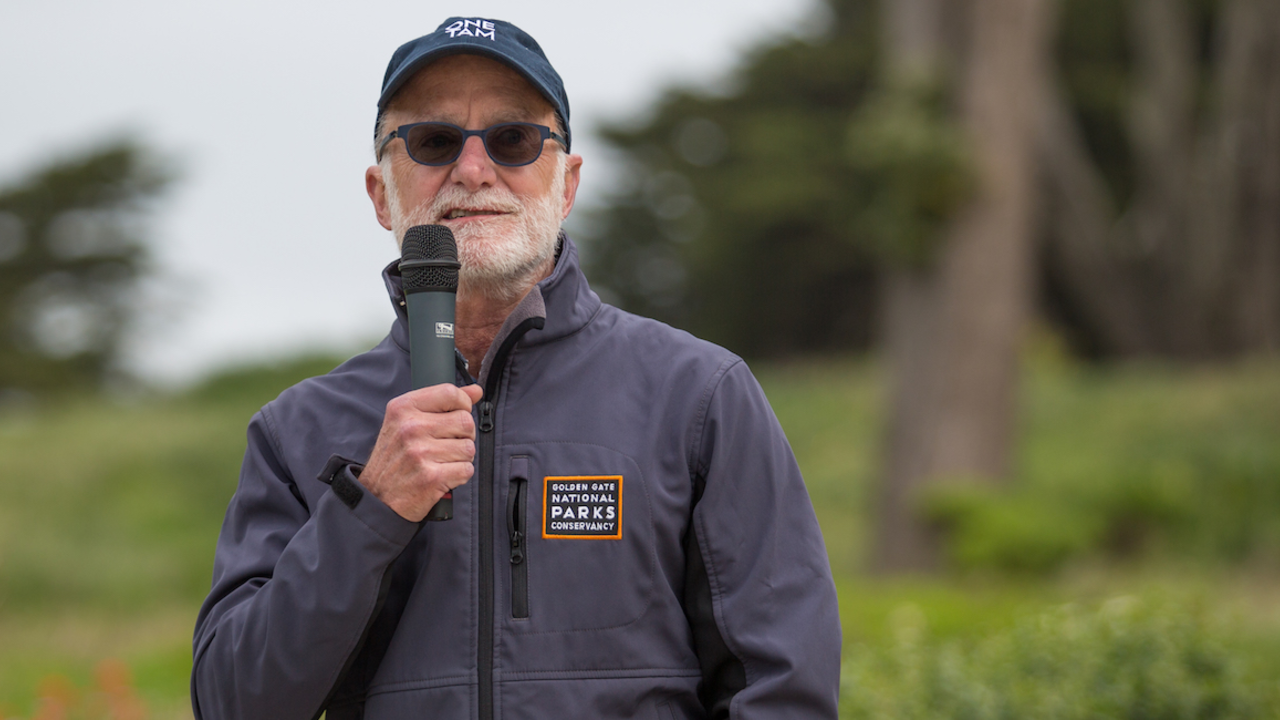 Greg Moore speaking at an event