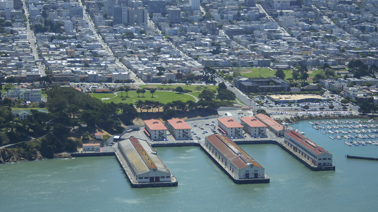 Aerial photo of Fort Mason, the San Francisco Bay, and the city.