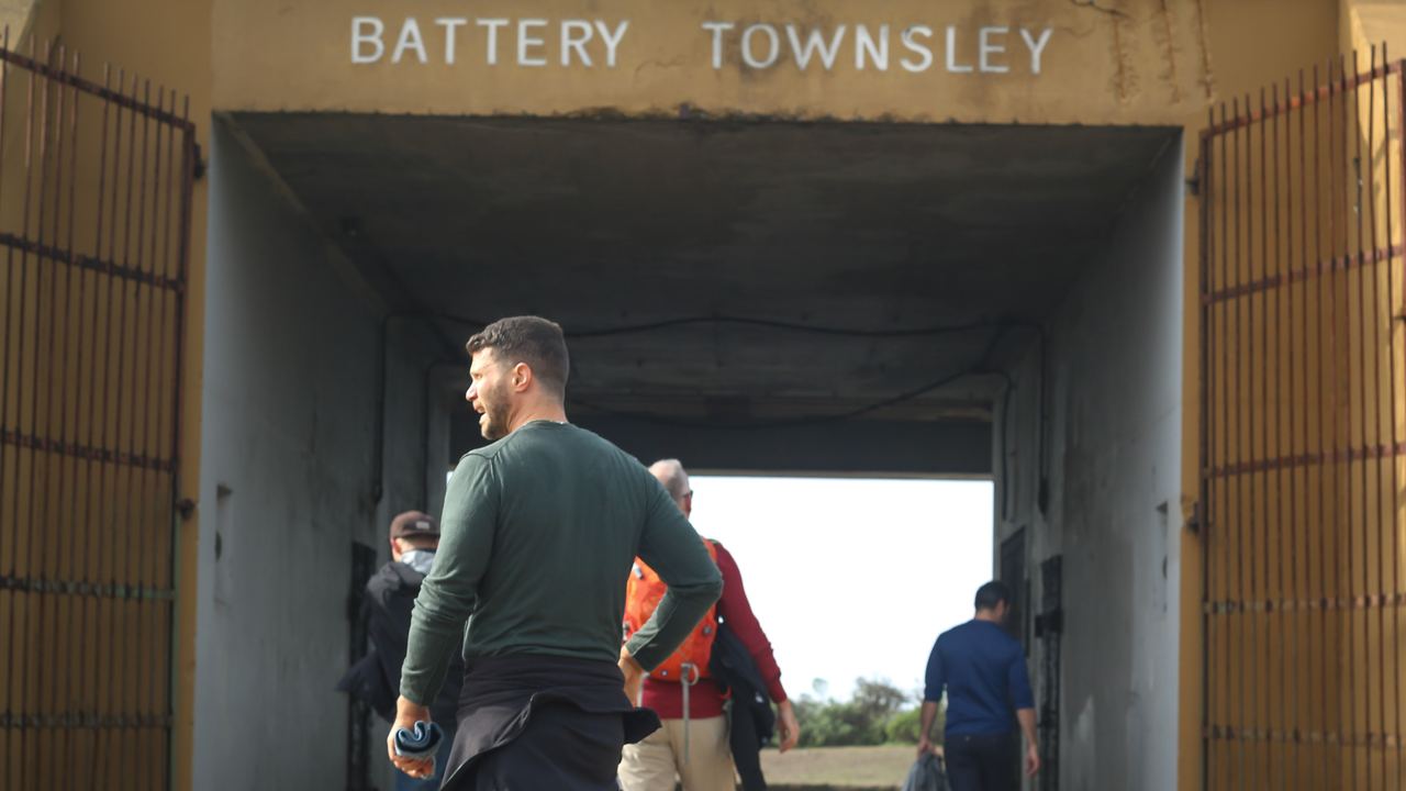 People walking into Battery Townsley