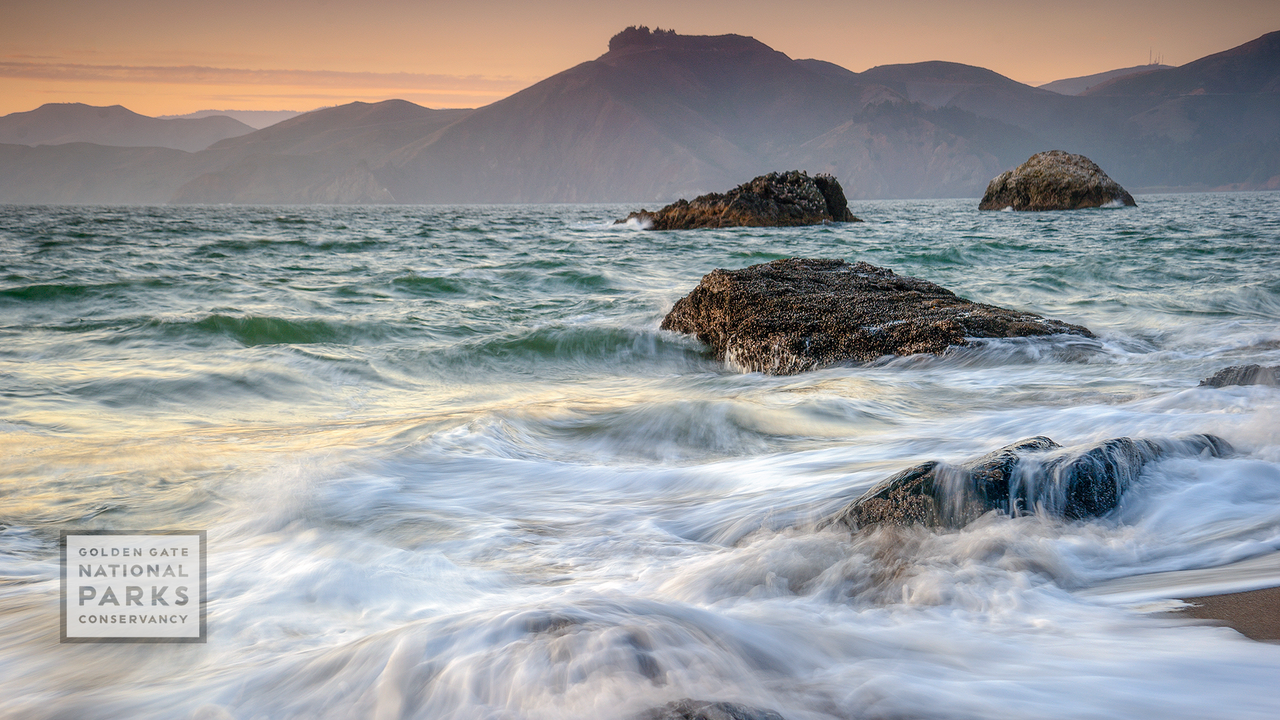 waves at the Presidio Beach at sunset